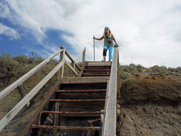 Karen Duquette at the top of the stairs